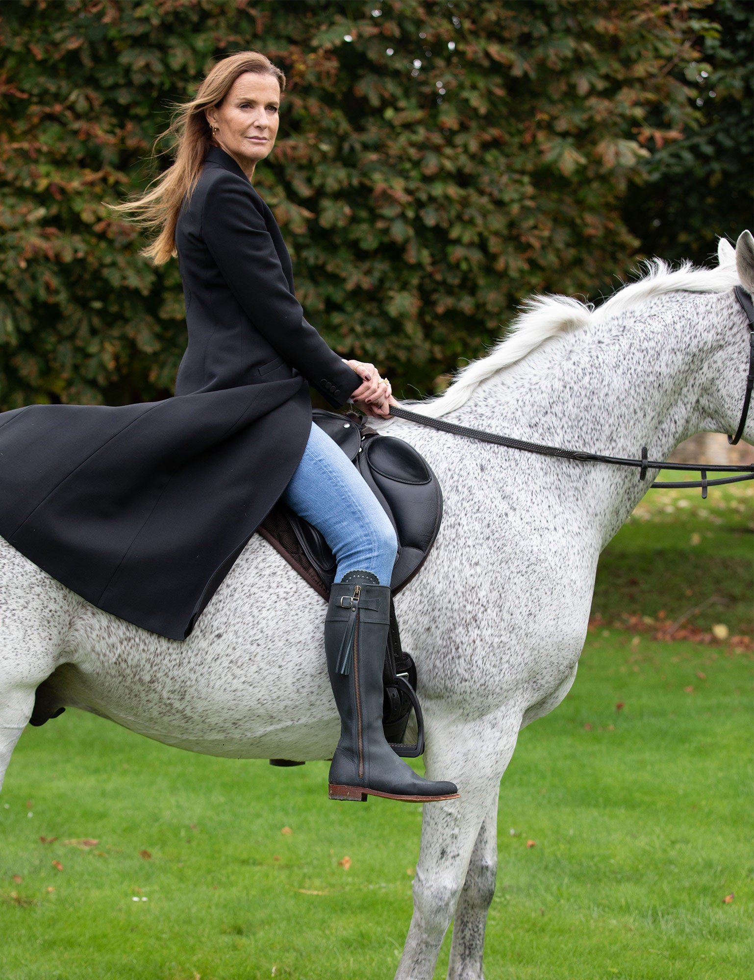 Penelope Chilvers riding tassel boots worn outdoors in the English countryside.