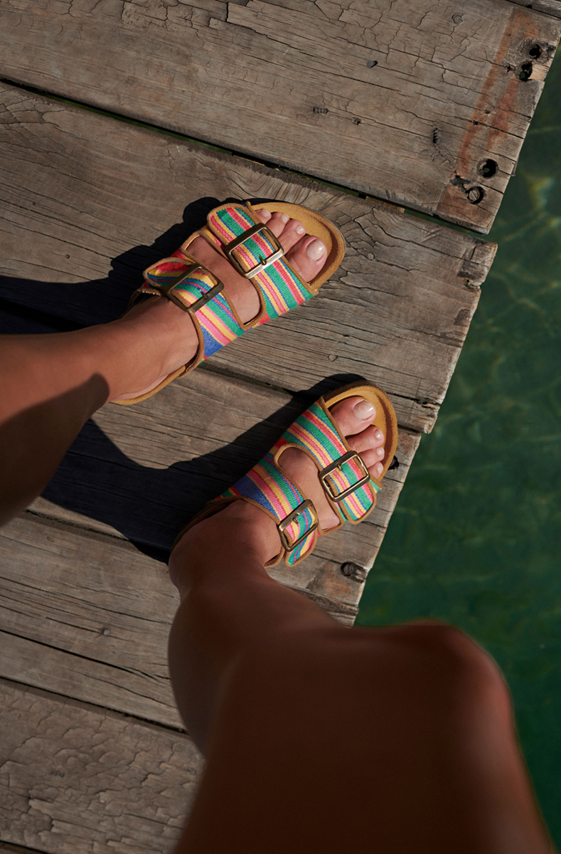 A pair of women's travel sliders